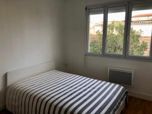 Posteľ alebo postele v izbe v ubytovaní Maison plain-pied Tarbes