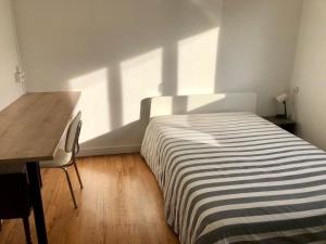 Posteľ alebo postele v izbe v ubytovaní Maison plain-pied Tarbes