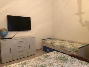 Postel nebo postele na pokoji v ubytování Casa Indipendente I DUE MARI