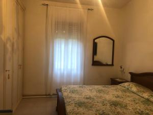 Postel nebo postele na pokoji v ubytování Casa Indipendente I DUE MARI