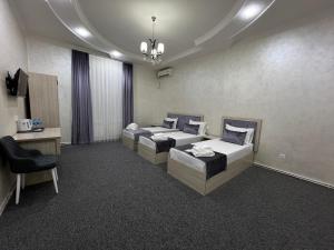 TV a/nebo společenská místnost v ubytování Art Tashkent Hotel