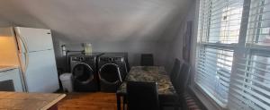 Cuisine ou kitchenette dans l'établissement Appartement Maufils