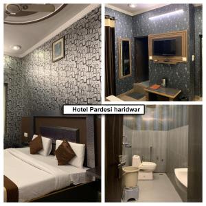 Postel nebo postele na pokoji v ubytování Hotel Pardesi,Har ki pauri Road Haridwar