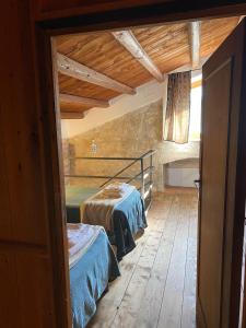 Postel nebo postele na pokoji v ubytování B&B Etico La Casa di Toti