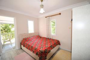 Postel nebo postele na pokoji v ubytování Villa HUZUR + 17 fotografií