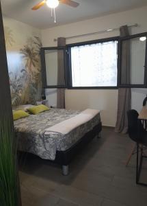 Postel nebo postele na pokoji v ubytování Chambre diamants