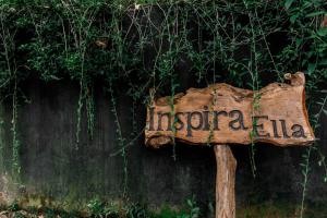 a sign that says indonesia in front of a wall at Inspira ella in Ella