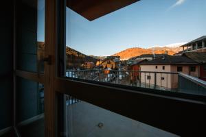 a view of a city from a window at Blue Sky Studio with pool and spa in Sinaia
