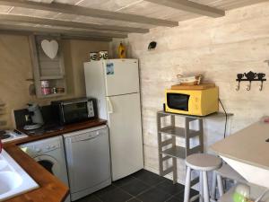 Köök või kööginurk majutusasutuses Gîte Mas La Tabatière +16 fotot