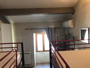 Voodi või voodid majutusasutuse Gîte Mas La Tabatière toas
