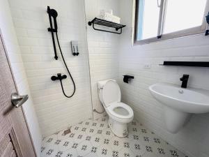 חדר רחצה ב-Qing Taoyuan Homestay