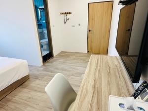 טלויזיה ו/או מרכז בידור ב-Qing Taoyuan Homestay