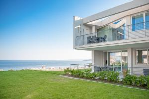 a house with a view of the ocean at 19 Summer Suites in Santa Cesarea Terme