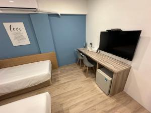 טלויזיה ו/או מרכז בידור ב-Qing Taoyuan Homestay
