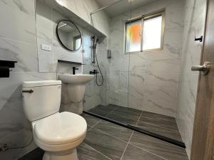 חדר רחצה ב-Qing Taoyuan Homestay