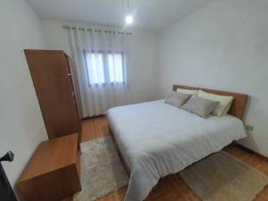 Postel nebo postele na pokoji v ubytování Casa Calçada