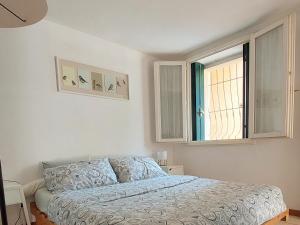 מיטה או מיטות בחדר ב-I love Vicenza Apartment