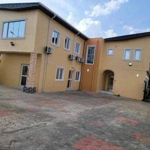 a house with a large driveway in front of it at B&Y ROYAL BAR & LOUNGE ADIGBE ROAD MONIJESU NEAR ADIGBE POLICE STATION in Abeokuta