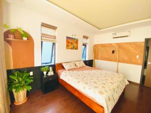 Postel nebo postele na pokoji v ubytování Laoxao Lakeview Homestay