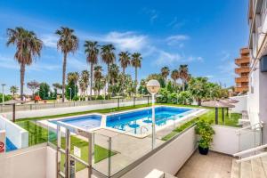 an image of a swimming pool at a apartment at APARTAMENTO CON ESPECTACULAR TERRAZA FRENTE AL MAR in Oropesa del Mar