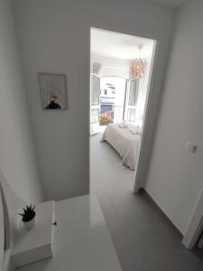 A bed or beds in a room at Residencial los Pinos 3