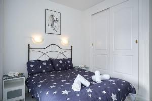 Postel nebo postele na pokoji v ubytování NFN Apartment Los Hidalgos Golf