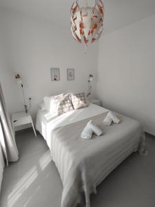 A bed or beds in a room at Residencial los Pinos 3