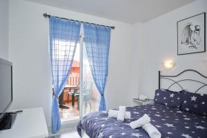 Postel nebo postele na pokoji v ubytování NFN Apartment Los Hidalgos Golf