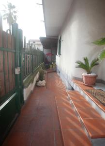 a walkway in a building with plants on it at B&B Gianni in Capodrise