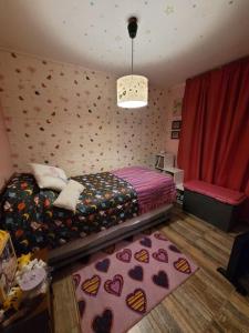 Katil atau katil-katil dalam bilik di Casa en el centro de Pirque