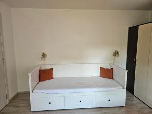 Кровать или кровати в номере Apartments Magnolija - Zagreb Centre