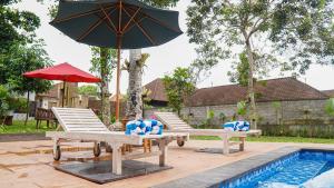 Bazén v ubytování Nyamane Ubud Green View Villas by EPS nebo v jeho okolí