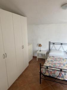 Posteľ alebo postele v izbe v ubytovaní Agriturismo L'Ulivo E Il Mare