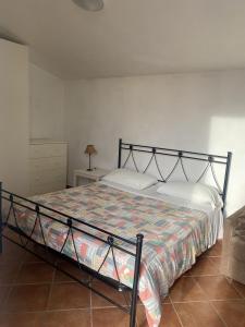 Posteľ alebo postele v izbe v ubytovaní Agriturismo L'Ulivo E Il Mare