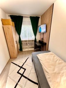 Postel nebo postele na pokoji v ubytování RentApart`s Nürnberg 4Room Apartment