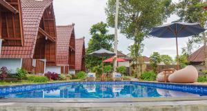 Bazén v ubytování Nyamane Ubud Green View Villas by EPS nebo v jeho okolí