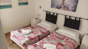 Posteľ alebo postele v izbe v ubytovaní LA GUGLIA - Guglia House-CANNAREGIO-VENEZIA