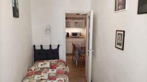 Posteľ alebo postele v izbe v ubytovaní LA GUGLIA - Guglia House-CANNAREGIO-VENEZIA