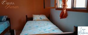 Кровать или кровати в номере Casa Montemar Hotel-San Vicente