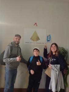 a group of three people posing for a picture at Grand Museum Pyramids Inn in Giza