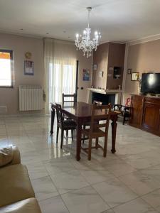 A television and/or entertainment centre at Casa Di Marzio