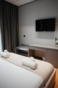 Postel nebo postele na pokoji v ubytování Toer Hotel & SPA