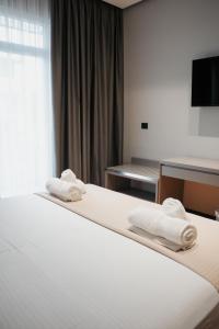 Postel nebo postele na pokoji v ubytování Toer Hotel & SPA