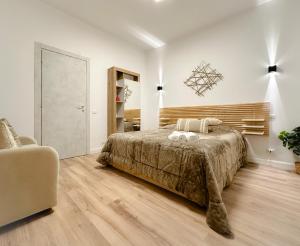 A bed or beds in a room at Colosseum Luxury Guest House