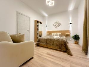 A bed or beds in a room at Colosseum Luxury Guest House