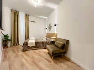 A seating area at Colosseum Luxury Guest House