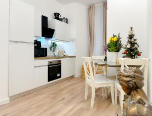 A kitchen or kitchenette at Colosseum Luxury Guest House