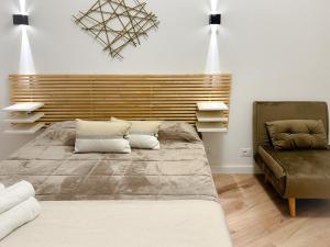 A bed or beds in a room at Colosseum Luxury Guest House
