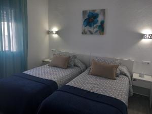 Posteľ alebo postele v izbe v ubytovaní Casa Patio Paraíso