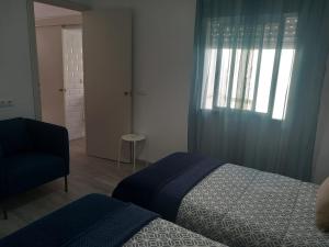 Posteľ alebo postele v izbe v ubytovaní Casa Patio Paraíso